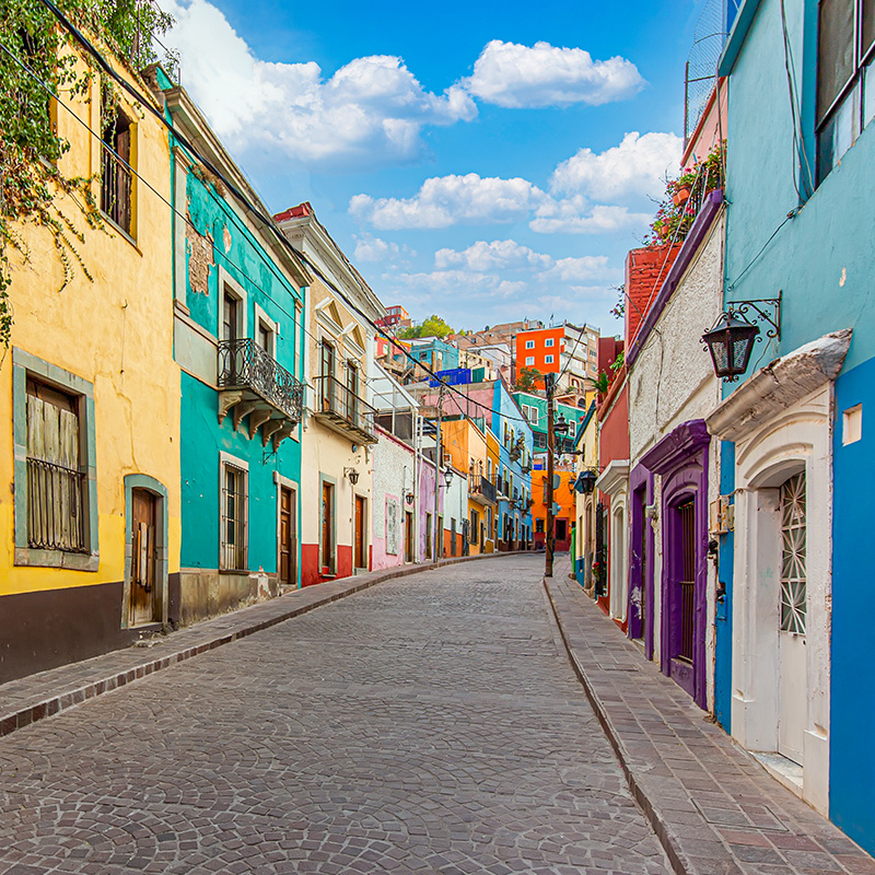 Guanajuato, Mexico, Scenic cobbled streets and traditional colorful colonial architecture in Guanajuato historic city center.